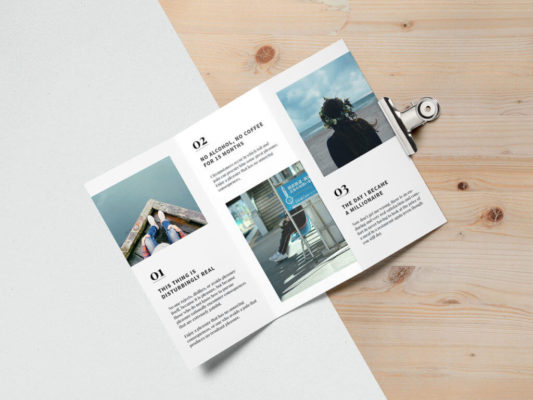 A white and black brochure with pictures on it