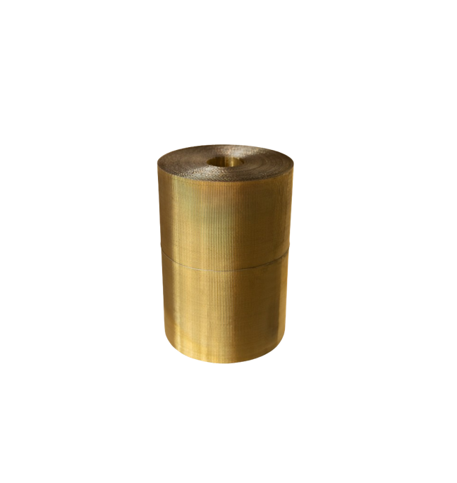A roll of brass tape is sitting on the floor.